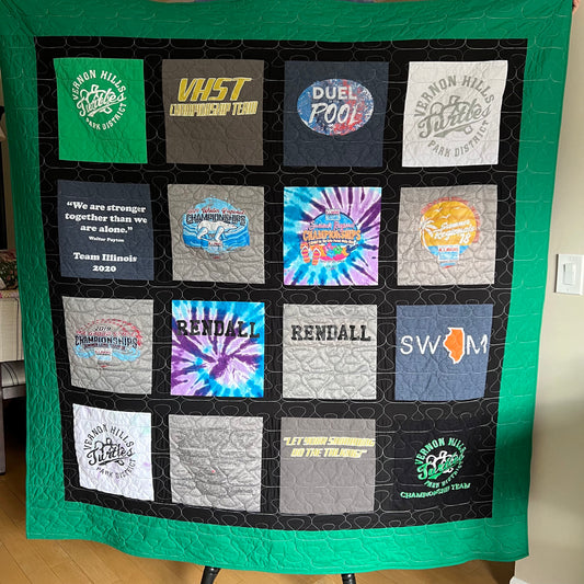 T-shirt quilt with 16 shirts and black and green border